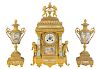 French Gilt Metal and Porcelain Clock Garniture