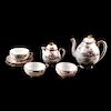 LOTE SIN RESERVA. Juego de té. Japón, siglo XX. Elaborados en porcelana semibrillante. Con escenas de patos salvajes. Piezas: 8
