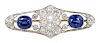 AN ART DECO BROOCH SET WITH SAPPHIRES AND DIAMONDS