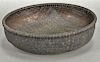 Silver woven round basket. dia. 10 in., 17.7 t oz. 
Provenance: Estate of Kenneth Jay Lane