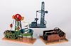 Three painted and lithograph tin steam toys