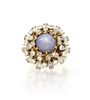 An 18 Karat Yellow Gold, Purple Star Sapphire and Diamond Ring, 10.00 dwts.