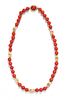 A 18 Karat Yellow Gold and Coral Bead Necklace, 41.40 dwts.