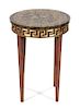 An Italian Directoire Style Occasional Table Height 22 1/2 x diameter 16 inches.