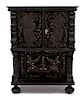 A Continental Diminutive Carved and Inlaid Cabinet Height 17 x width 12 1/2 x depth 8 1/2 inches.