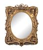 A Victorian Carved Giltwood Mirror Height 43 x width 32 inches.