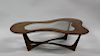 MIDCENTURY. Biomorphic Coffee Table with Glass Ins