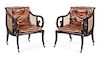 A Pair of Regency Ebonized and Parcel Gilt Library Chairs Height 37 inches.