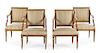 A Set of Four Swedish Parcel Gilt Beechwood Arm Chairs Height 35 inches.