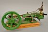 Horizontal steam engine, belt driven Governor, green cast iron with brass fittings, 7" dia. flywheel, 3" stroke.