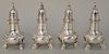 Four sterling silver pepper shakes with dolphin tops. ht. 5 1/4 in. 17.6 t.oz.