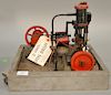 Two engines mounted on wood base vertical single cylinder along with two cylinder horizontal. ht. 7'' - 10''