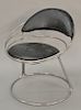 Memphis style leather and stainless steel side chair.
