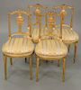 Set of four gilt Louis XVI style side chairs.