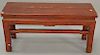 Chinese Oriental bench, red. ht. 19 1/2 in., top: 13" x 39"