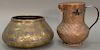 Two piece lot to include multi metal Middle Eastern hand spun bowl (19th century or later) and brass repousse pitcher (missing finiol).