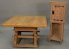 Two piece lot to include square oak table with slide top (ht. 29 in. top: 45" x 47") and a one door cabinet having carved figure on ...