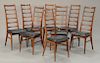 Set of eight Niels Kofod Larsen rosewood bow tie back dining chairs. ht. 42 in.