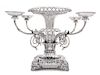 A George III Silver Epergne, Paul Storr, London, 1814, the foliate rim above an openwork basket and acanthus and mask decorated