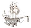 A German Silver Nef, B. Neresheimer & Sohne, Hanau, Late 19th Century, modeled as a three-masted ship, the hull worked to show r