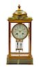 A French Onyx and Brass Crystal Regulator Clock Height 16 1/4 inches.
