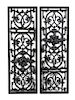 A Pair of Cast Iron Grates Height of each 40 x width 13 1/2 inches.