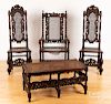 Jacobean style carved oak cane seat bench