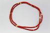 Red coral bead necklace.