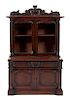 A Victorian Diminutive Carved Mahogany Step-Back Cabinet