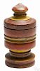 Turned and painted lidded wood canister, 19th c., retaining its original red and yellow surface