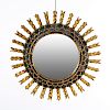 Espejo. Siglo XX. Diseño solar. Con luna circular, teselas de espejo.