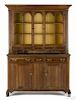 Pennsylvania poplar two-part Dutch cupboard, ca. 1800, with arched glazed panel doors