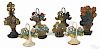 Eight painted, cast iron figural flower doorstops, 20th c., to include four Hubley no. 120
