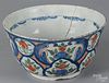 Dutch Delft tin glazed earthenware punch bowl, mid 18th c., with polychrome floral decoration