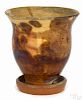 Shenandoah Valley, Virginia redware flowerpot, 19th c., with attached saucer and roulette rims