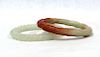 One Carved Rope Celadon Jade Bangle, together with