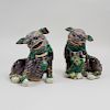 Pair of Chinese Aubergine, Green and Yellow Glazed Porcelain Models of Buddhistic Lions