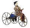 Early American Tin Clockwork George Brown Boy on Velocipede Toy.