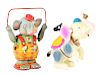 Lot of 2: Tin Litho and Celluloid Wind Up Circus Elephants.