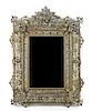 An Italian Rococo Style Metal Mirror, Height 25 x width 17 inches.
