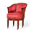 Neoclassical mahogany revolving library armchair