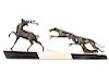 An Art Deco metal and marble hounds & stag