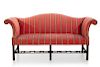 A George III style upholstered mahogany sofa