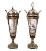 A Pair of Sevres Style Porcelain and Gilt Metal Mounted Covered Urns, Height 17 1/2 inches.