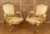 PAIR GILT CARVED OPEN ARM CHAIRS CIRCA 1920
