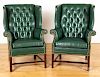 Pair of Chippendale style wing chairs.