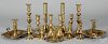 Collection of brass candlesticks