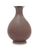 A Copper Red Glazed Porcelain Vase, Yuhuchun Ping Height 11 1/4 inches.