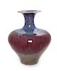 * A Flambe Glazed Stoneware Vase Height 10 1/2 inches.