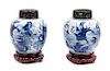 * A Pair of Blue and White 'Mythical Beast' Porcelain Ginger Jars Height 8 1/2 inches.